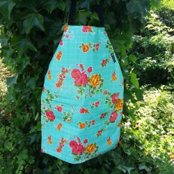 Forkl�de i mint gr�n voksdug med blomster
