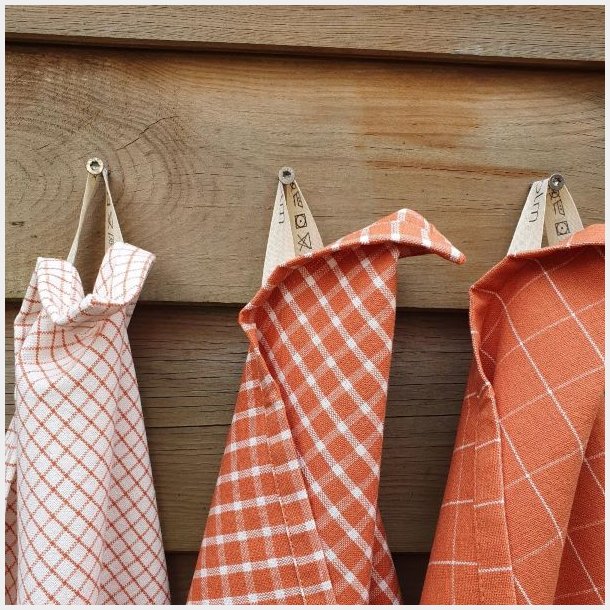 varme orange og rust nuancer i de smukke viskestykker