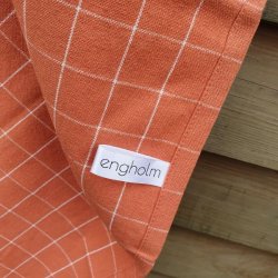 en fin sidestrop i de ornage viskestykker i genbrugsbomuld