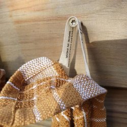 strop i det ene hjrne i det smukke khaki frotte viskestykke