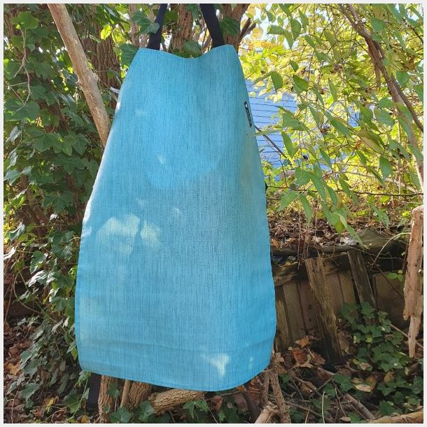 frisk turkis forklde i voksdug