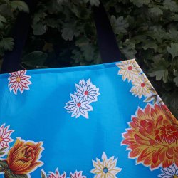 Forklde i voksdug i turkis