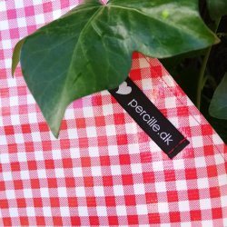 Forklde i voksdug med rde tern