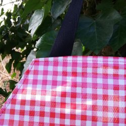 Forklde i voksdug med rde tern